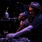 Peter Knight, David Wilfred and Paul Grabowsky (front to back) perform ‘Raki’.